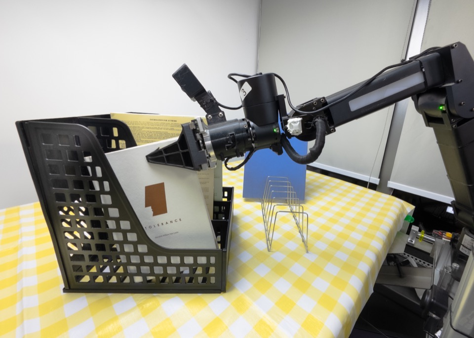 Insert a book onto a shelf, robot execution frame 1