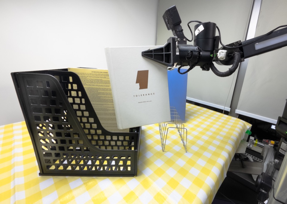 Insert a book onto a shelf, robot execution frame 2