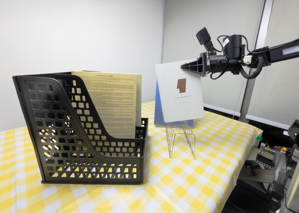 Insert a book onto a shelf, robot execution frame 3