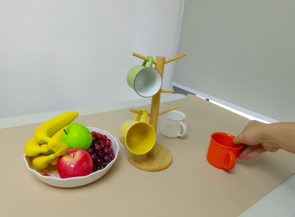 Pour a drink into a bowl, human demonstration frame 1