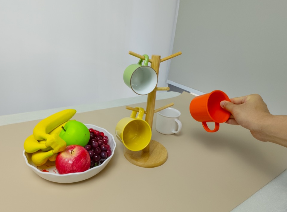 Pour a drink into a bowl, human demonstration frame 2