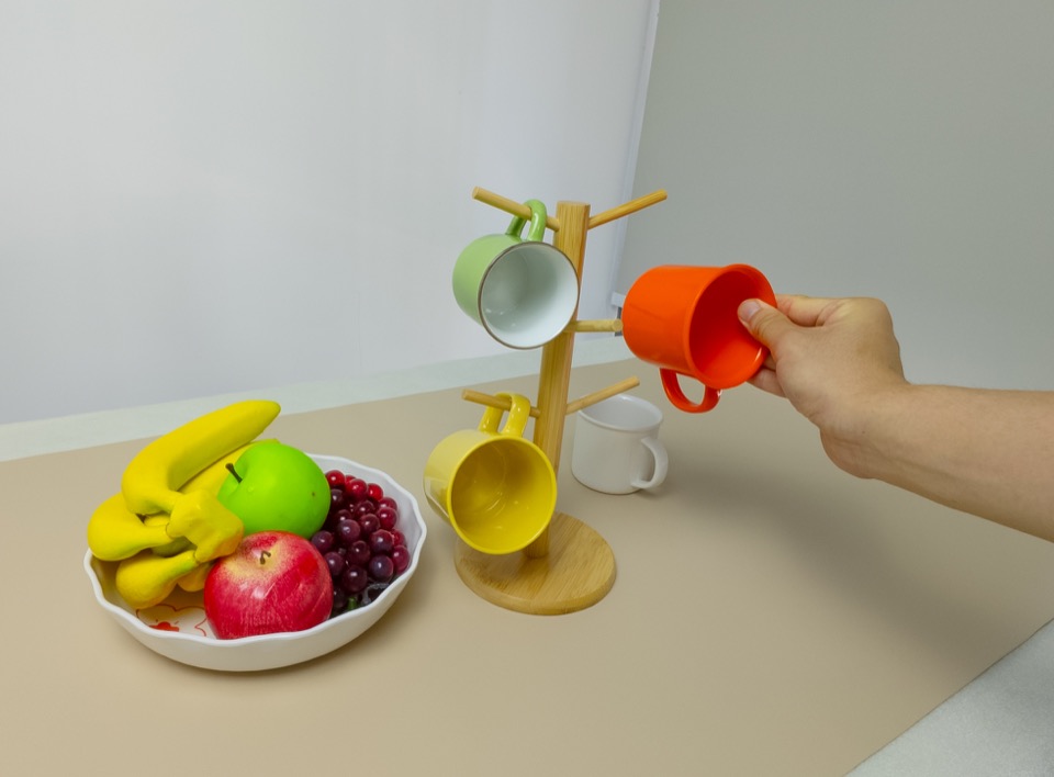 Pour a drink into a bowl, human demonstration frame 3